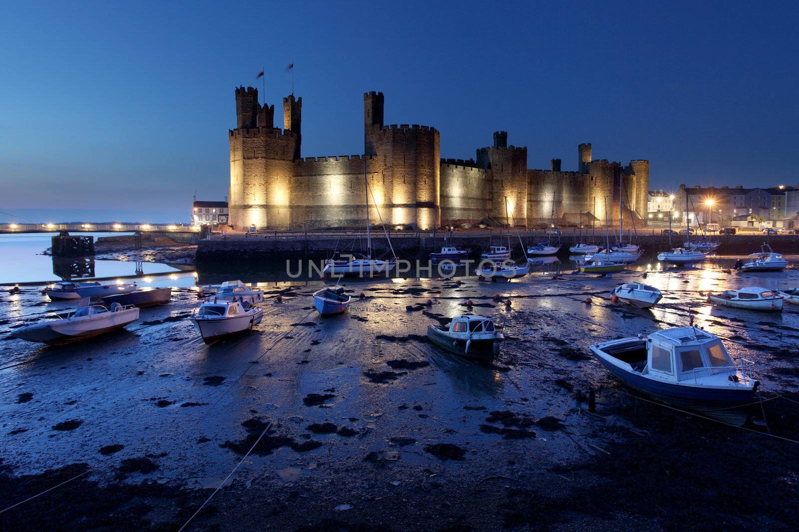 Medievil Caernarfon castle at twilight in north Wales 