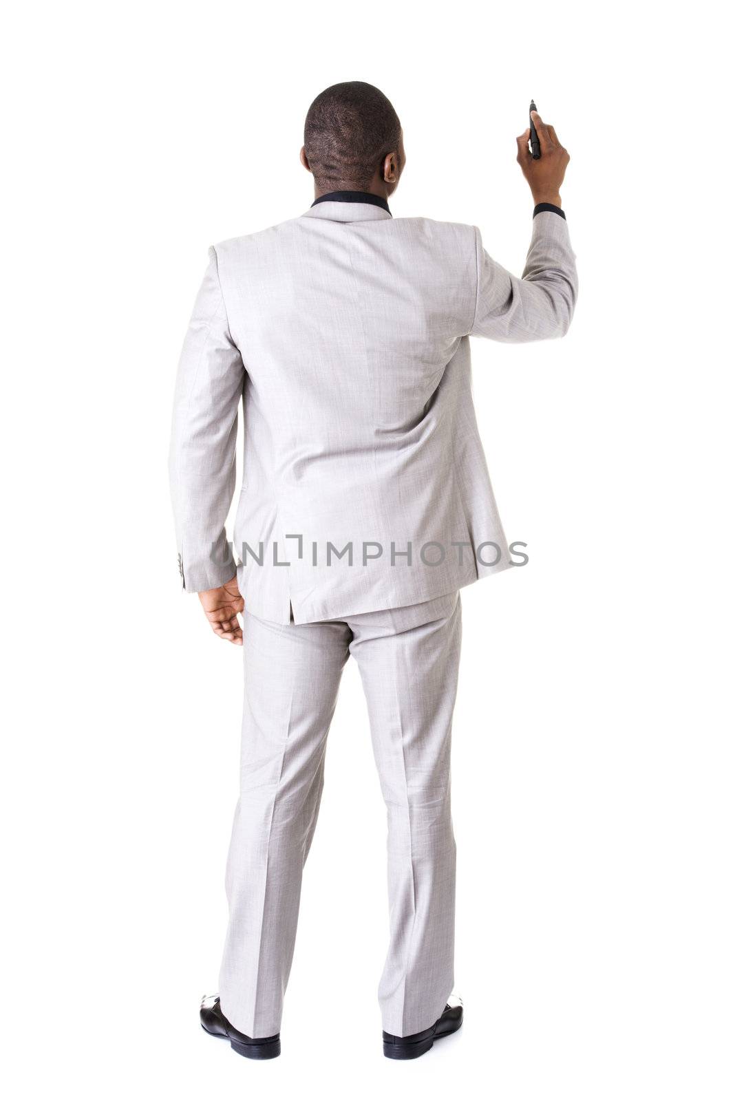 Businessman drawing something abstract with black marker, isolated on white background