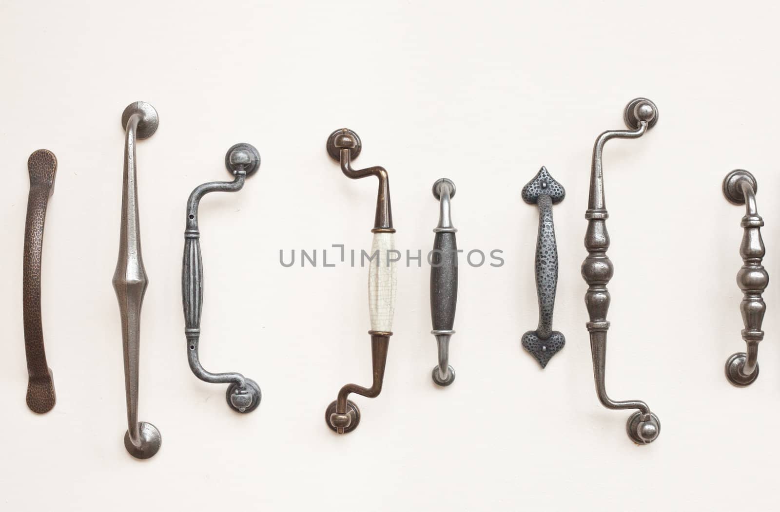 A selection of antique wrought iron door handles