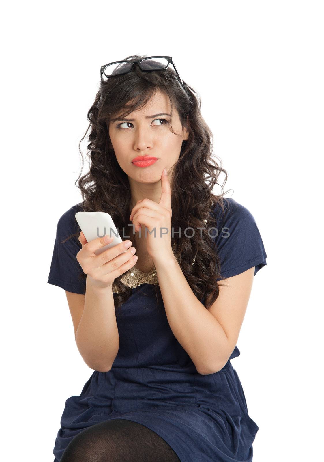 Woman in glasses emotionally speaks on a mobile phone