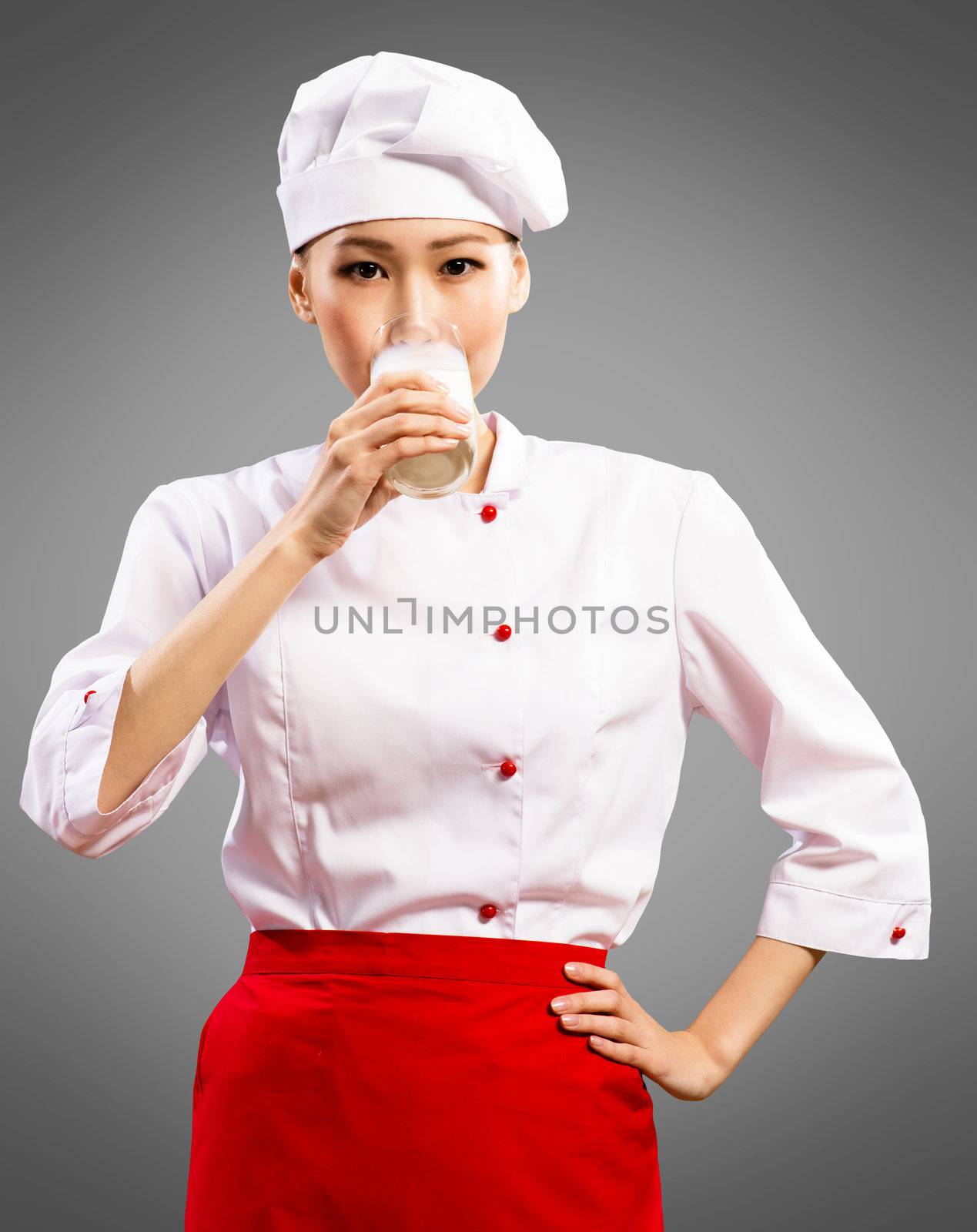 Portrait of Asian cooks, drink a glass of milk