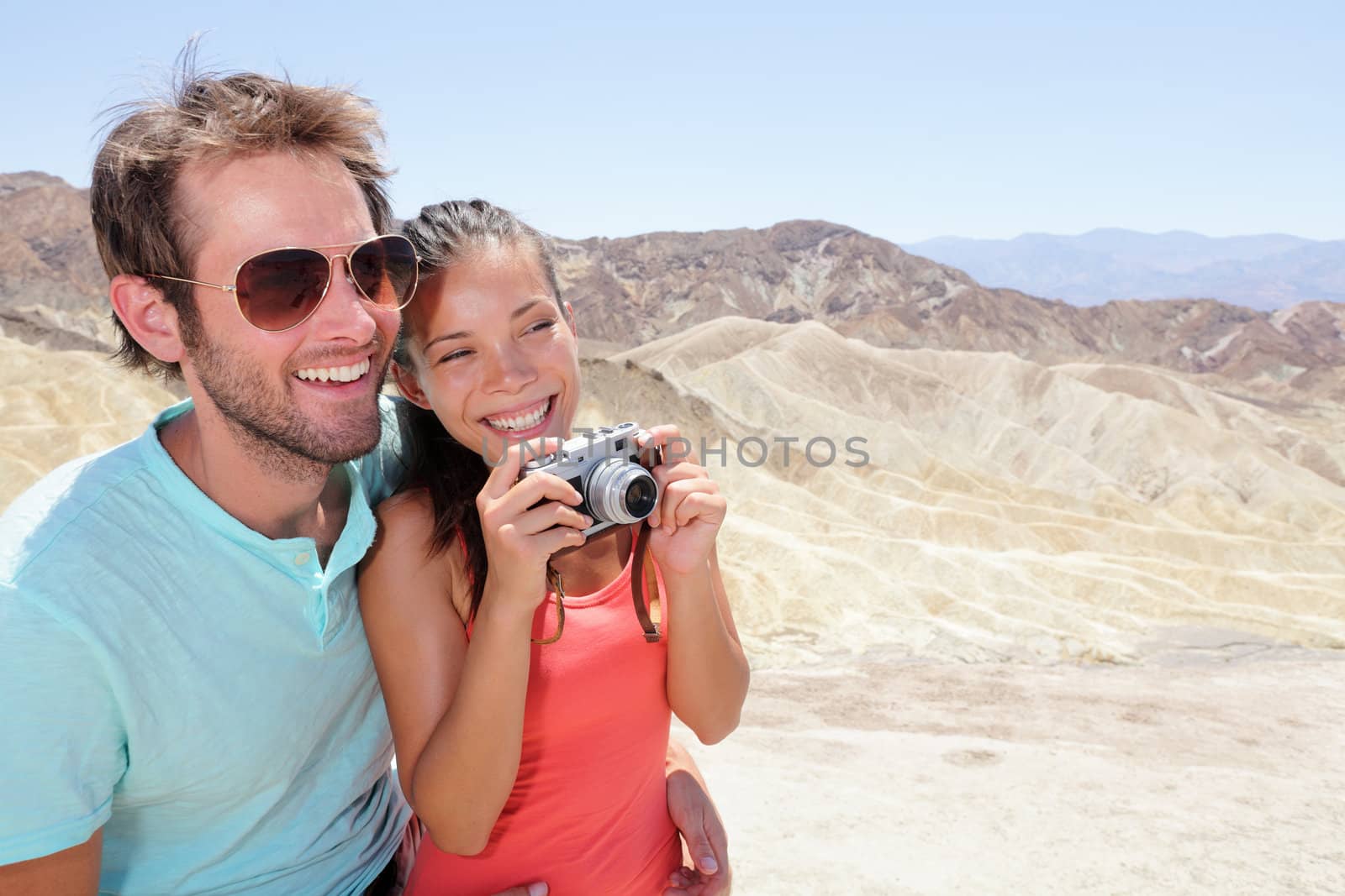 Tourists couple fun in Death Valley by Maridav