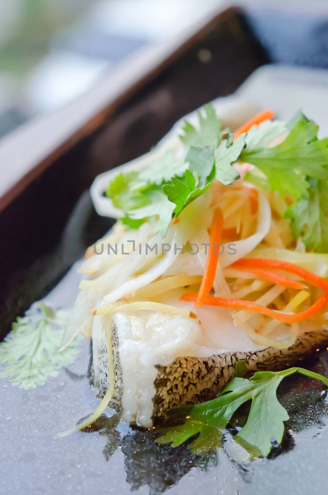 steamed white fish with vegetable , asian cuisine