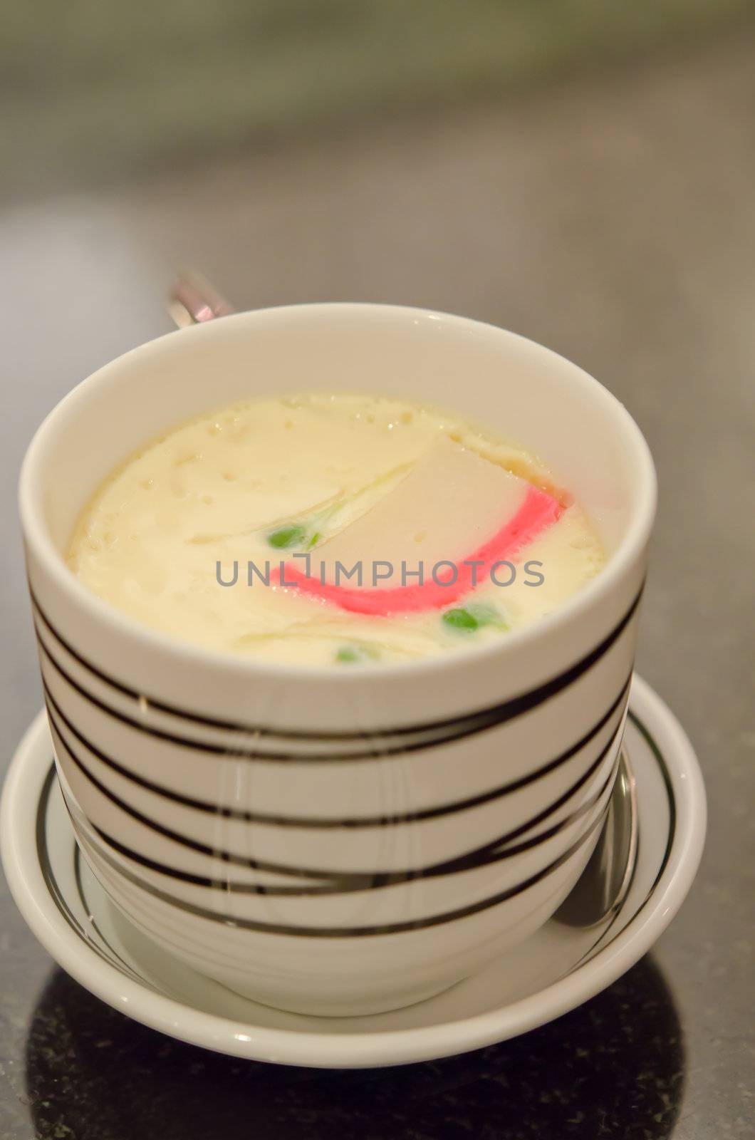 Chinese Steam egg with mushroom and vegetable in bowl