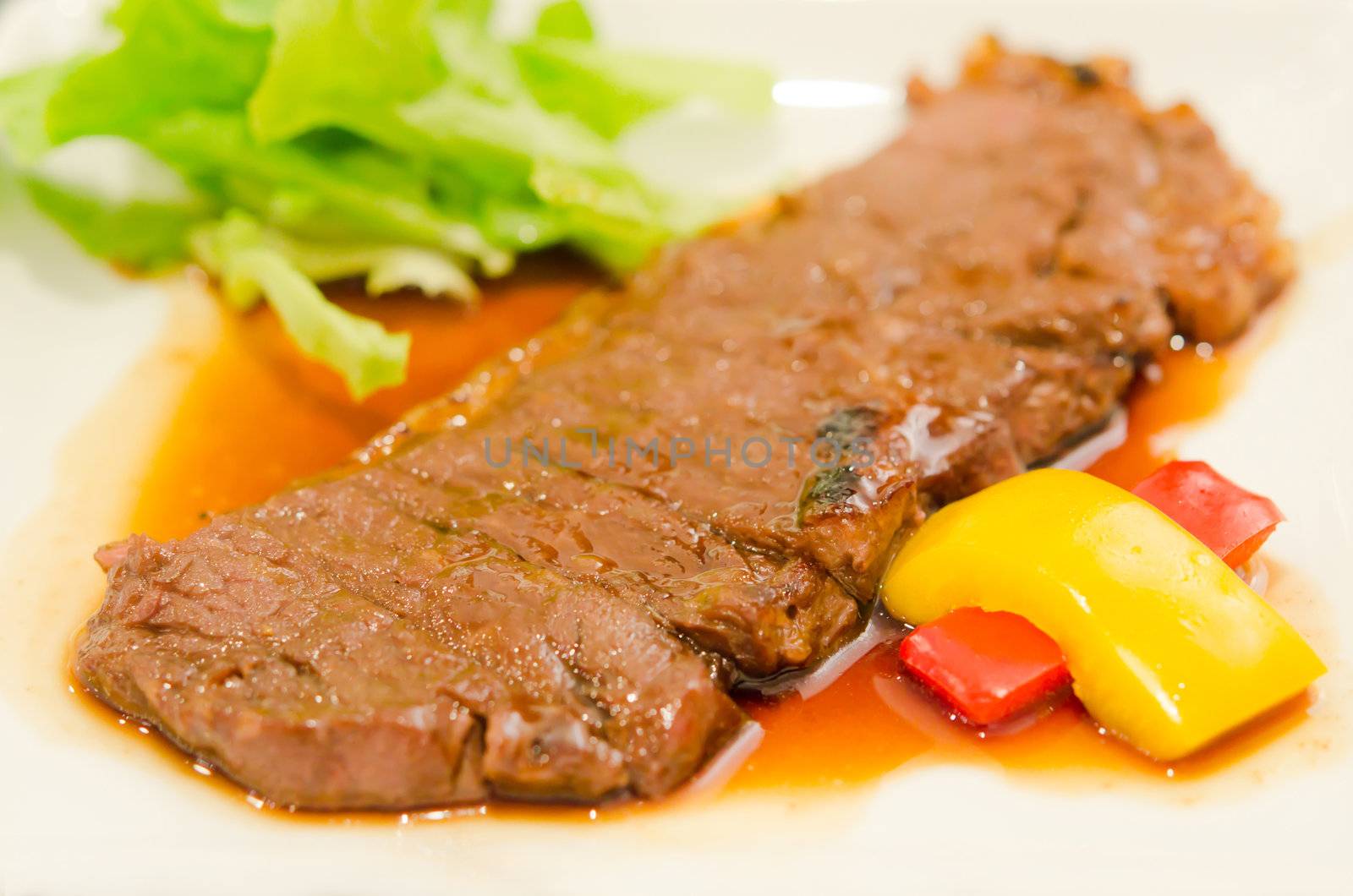 roasted beef  with fresh vegetable on plate