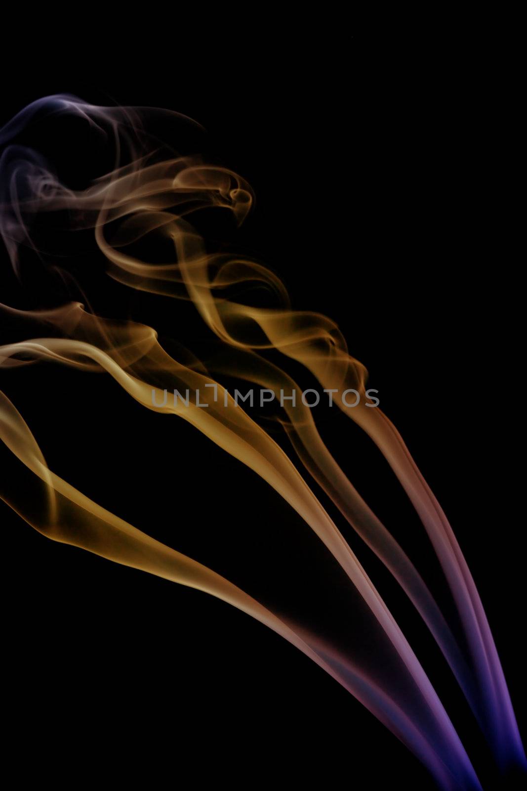 wave and smoke of different colors on black background