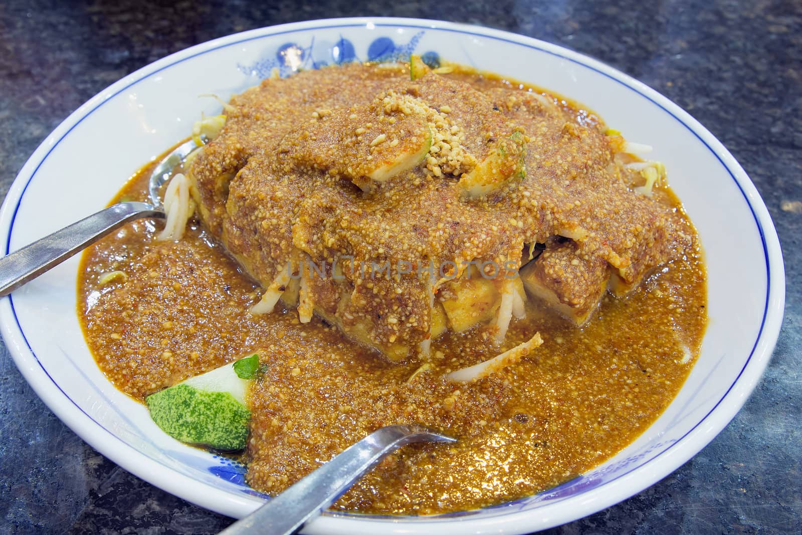 Tauhu Goreng Fried Tofu Dish with Cucumbers Bean Sprouts Covered with Peanut Gravy Sauce