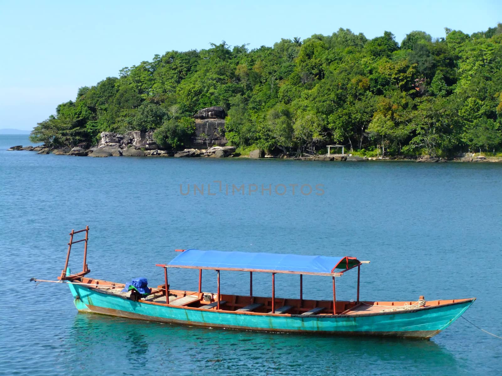 Traditional wooden boat, Sihanoukville, Cambodia by donya_nedomam