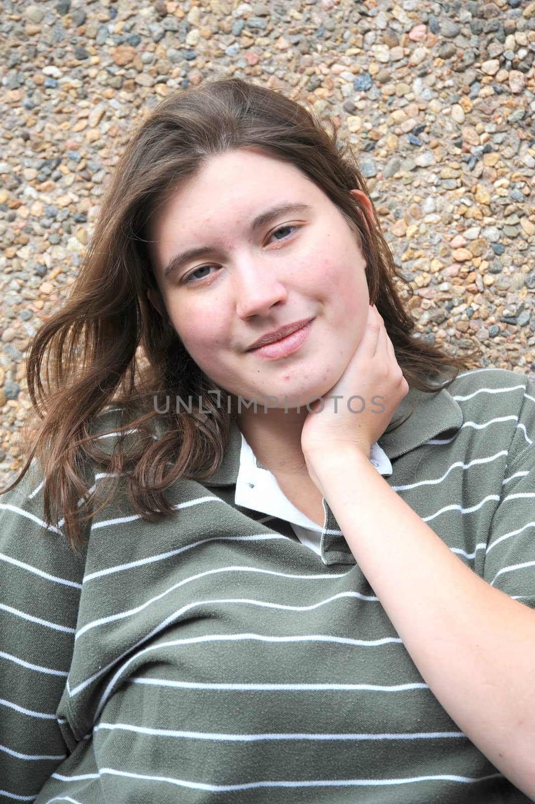 Female tomboy posing outside.