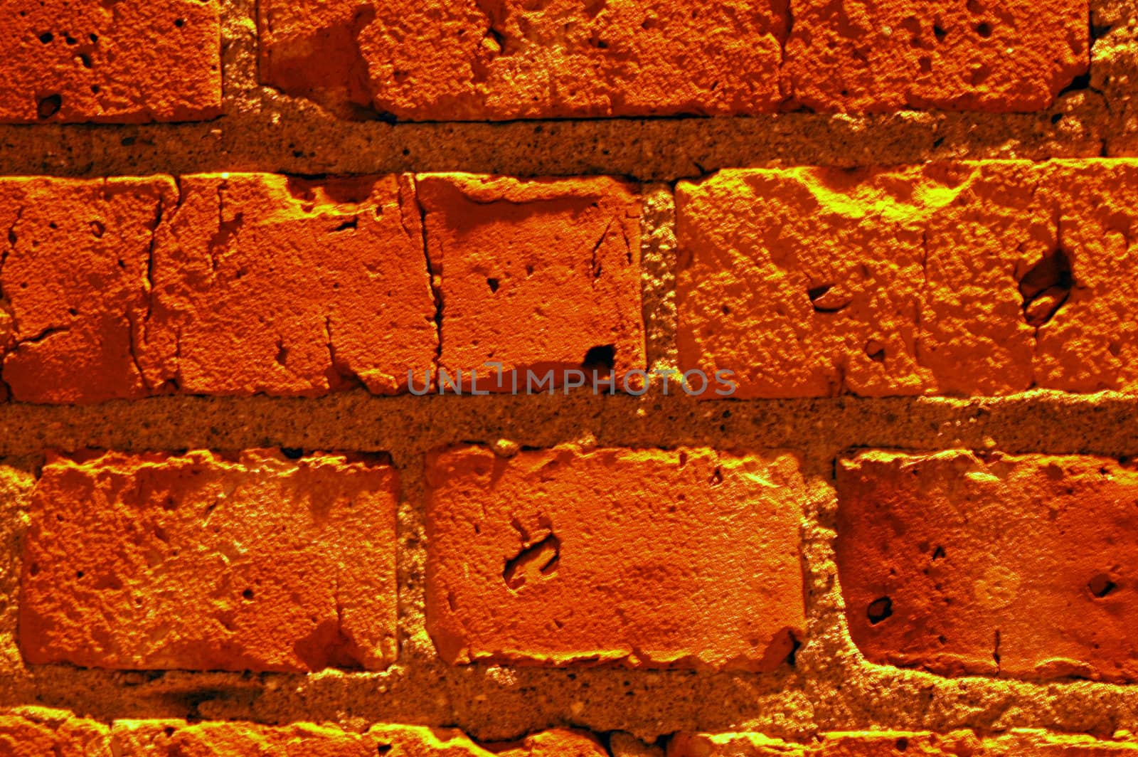 Red brick wall on a building exterior.