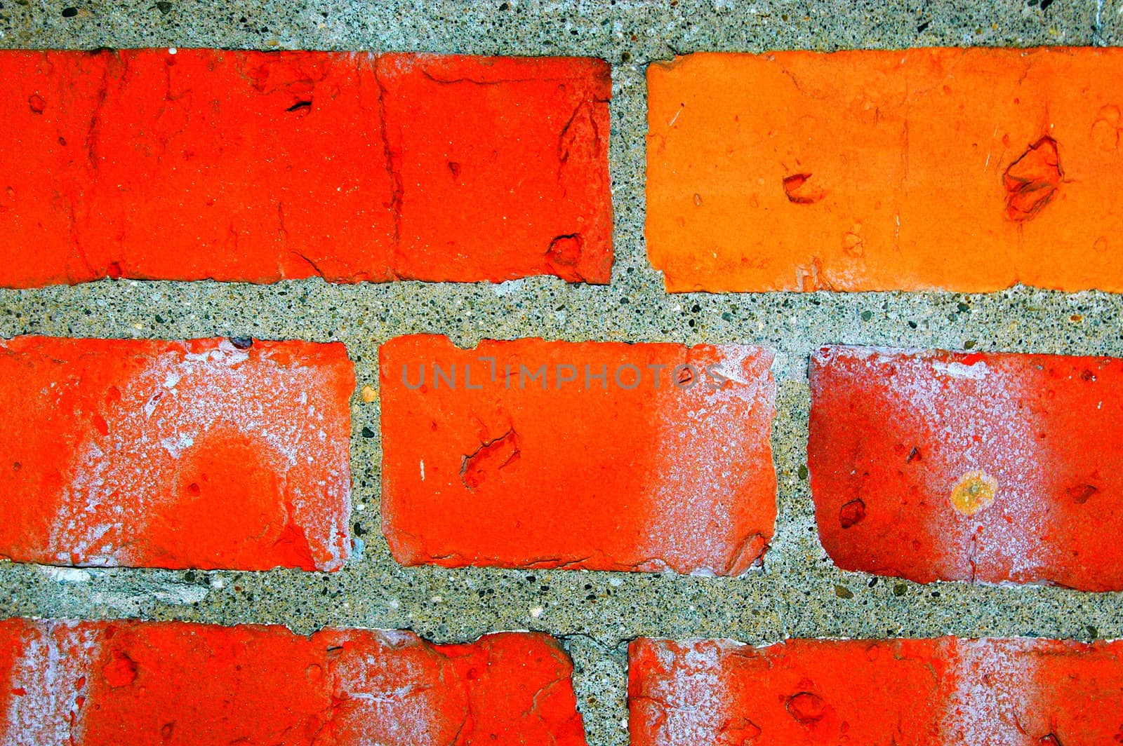 Red brick wall on a building exterior.