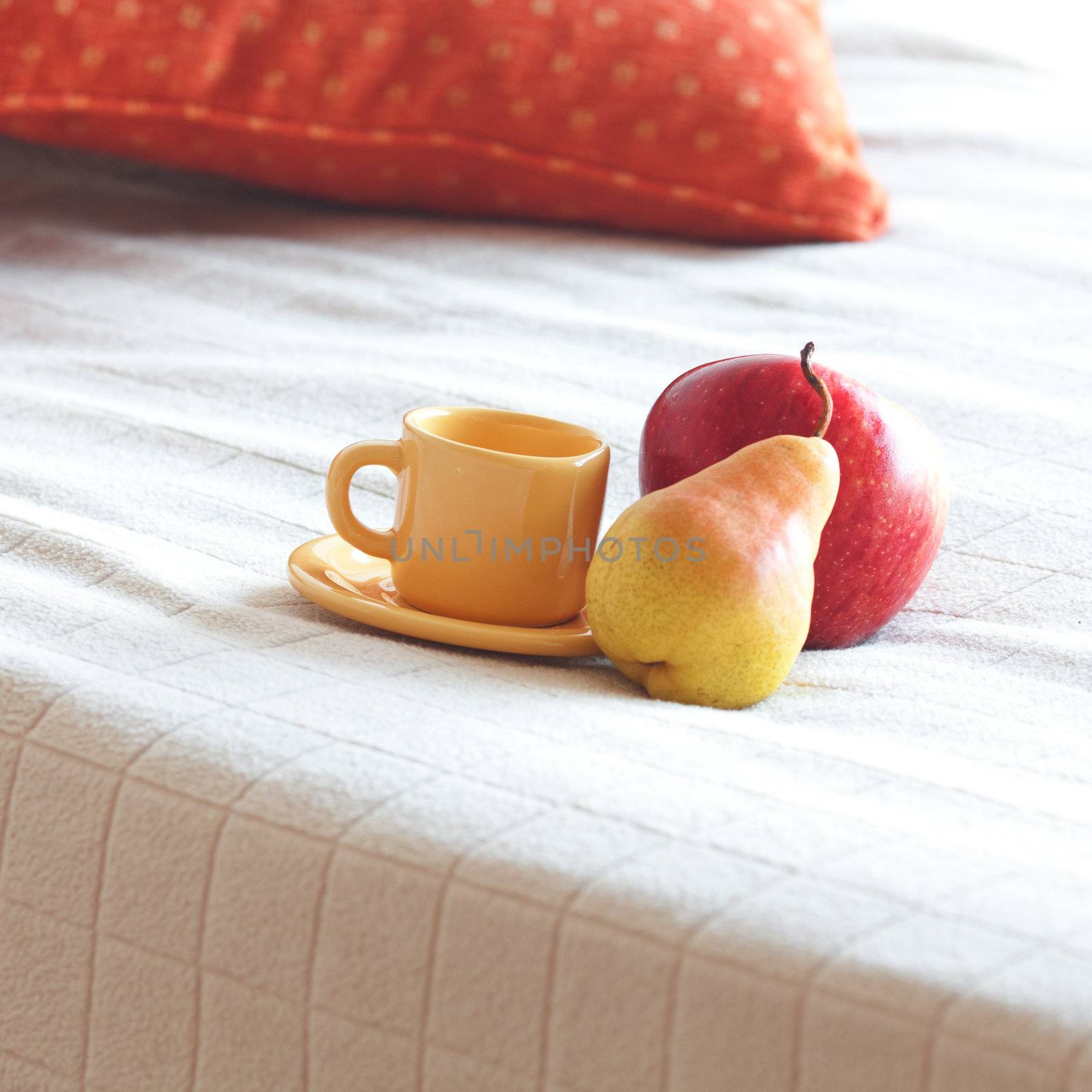 cup of tea,apple and pear on the bed by jannyjus