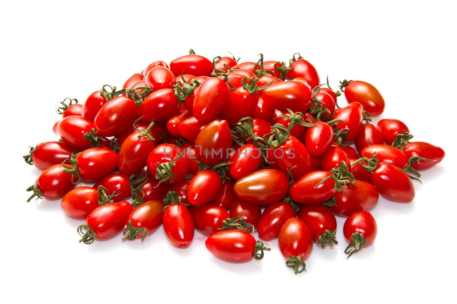 group of fresh red tomatoes isolated on white background
