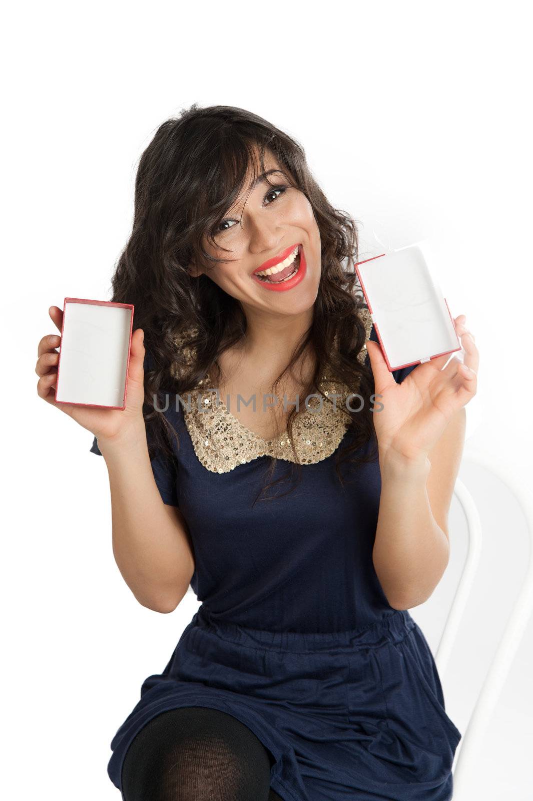 Happy woman with a surprise gift opens