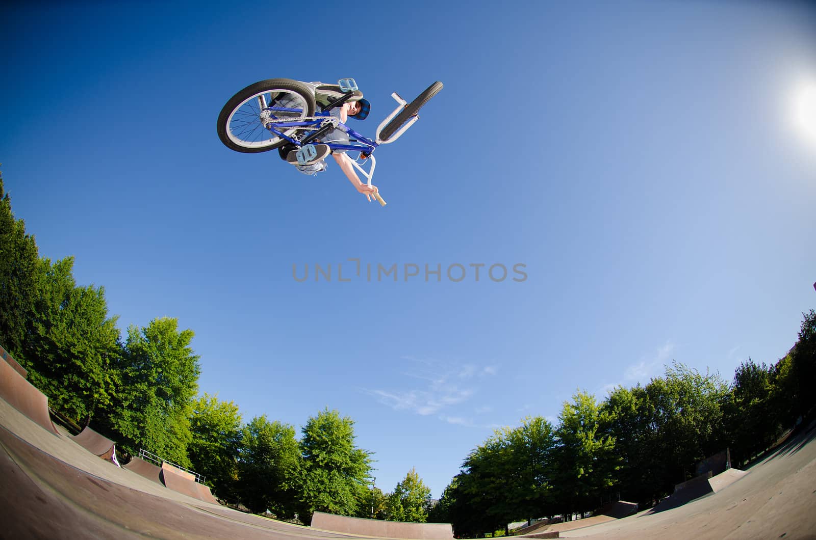 High BMX jump in a skate park.