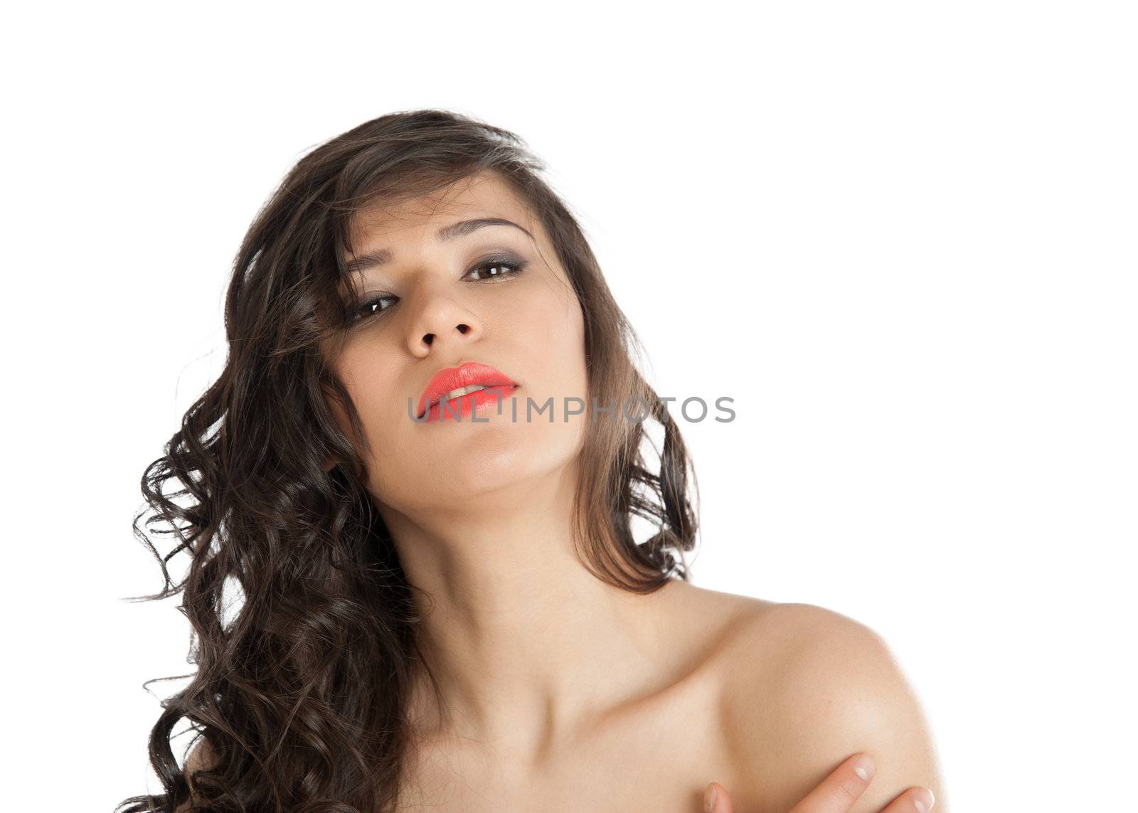 Sexy woman with bare shoulders on a white background