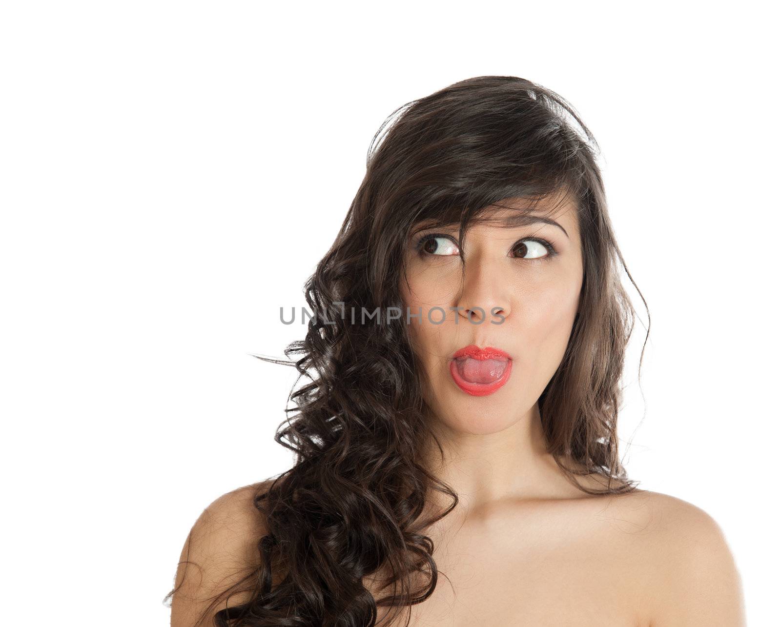 Portrait of a woman showing tongue on white background