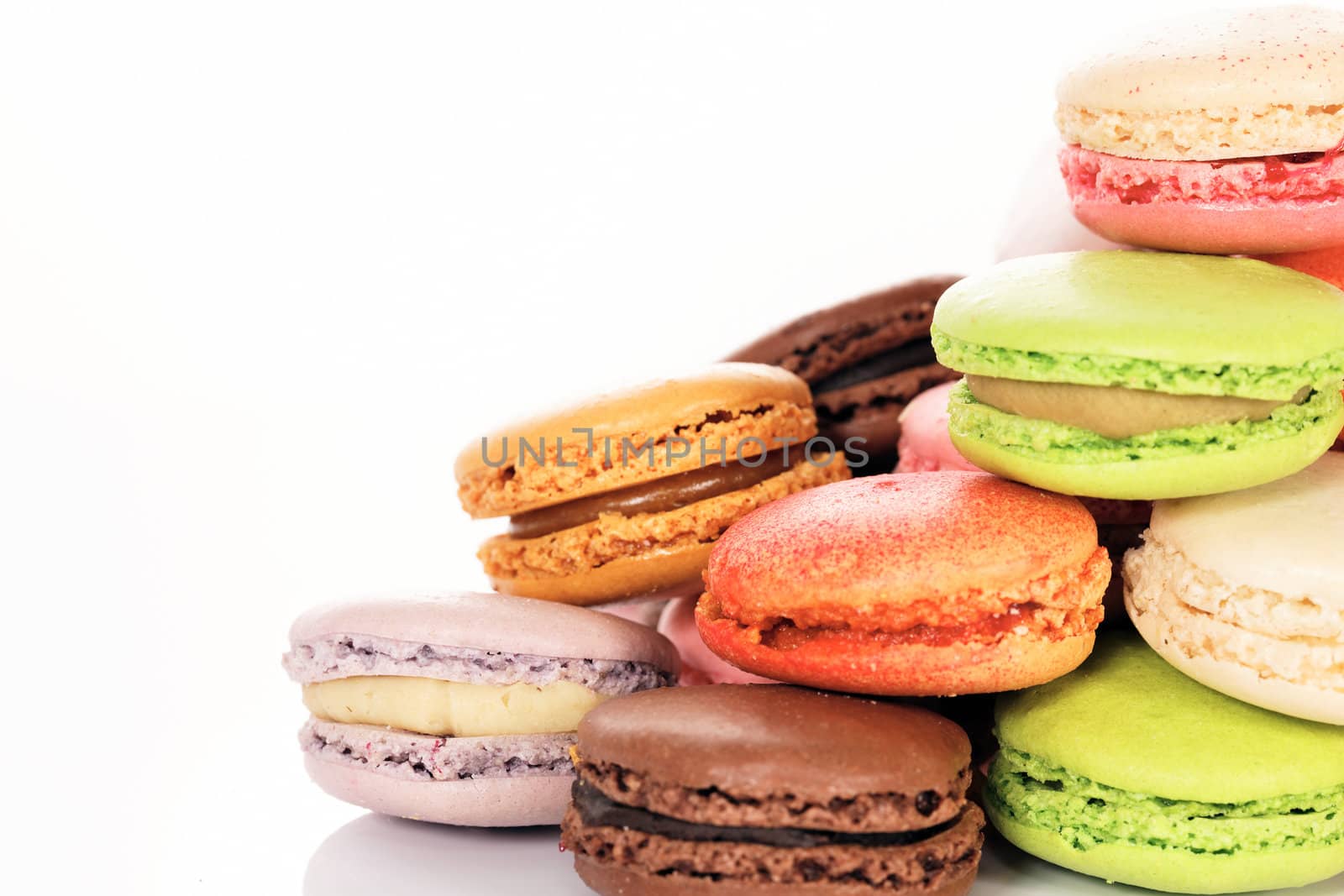 colorful macaroons assortment isolated on white background 