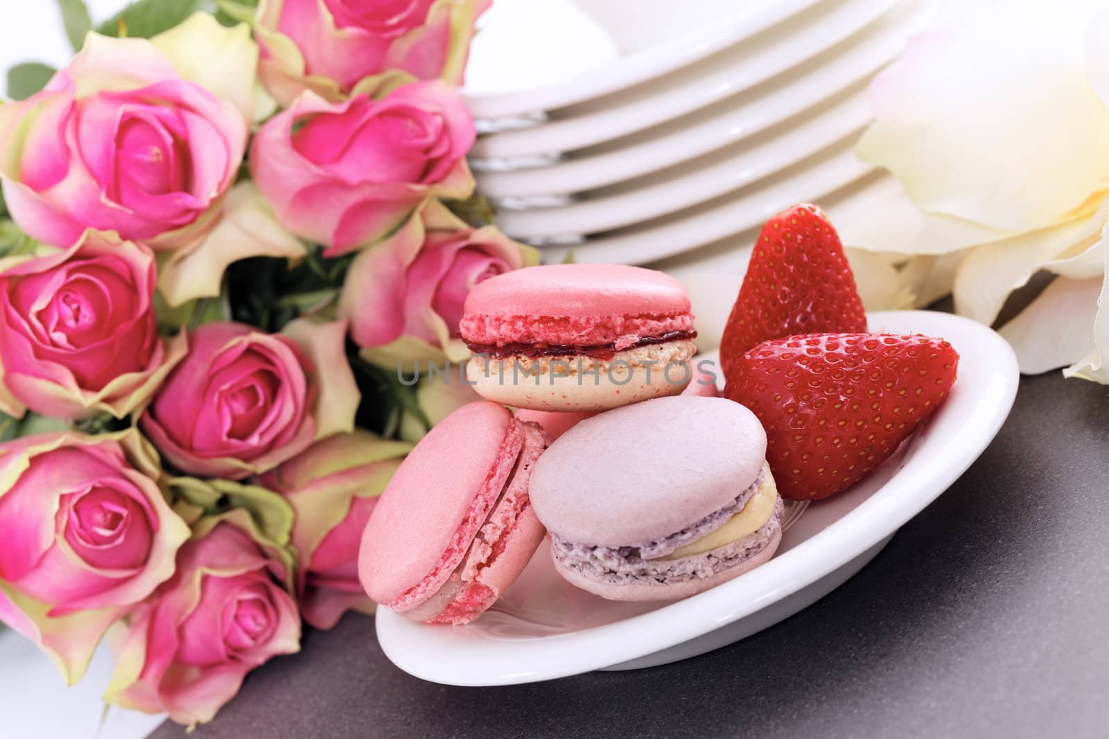Dessert on valentine's include macaroons and strawberry