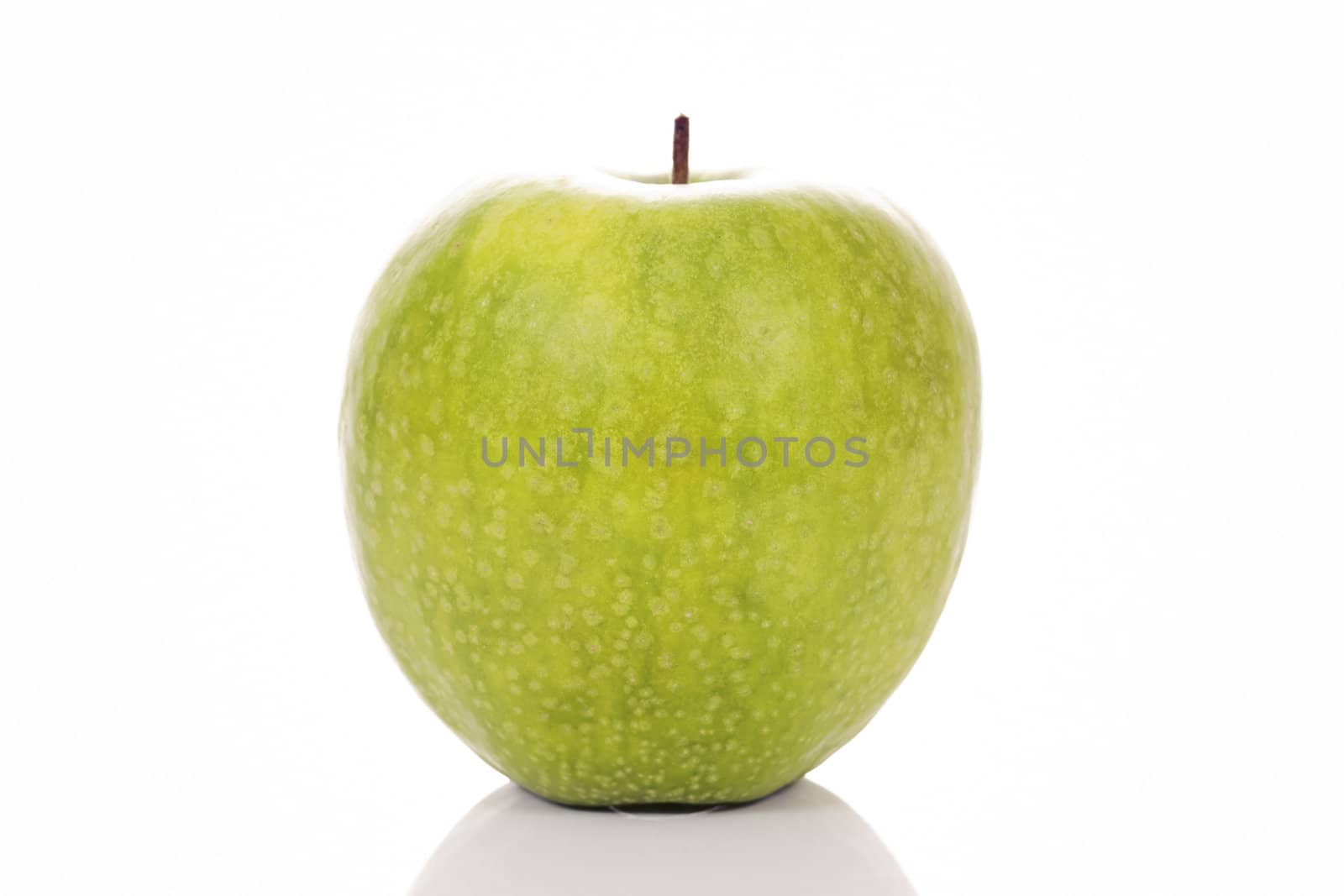 green apple on white background in studio
