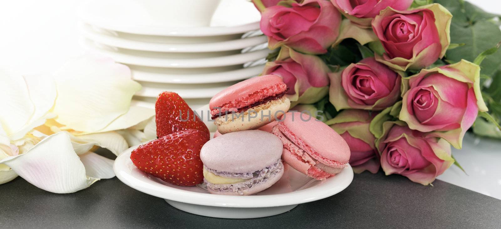 wedding dessert with macaroons and roses, panoramic view