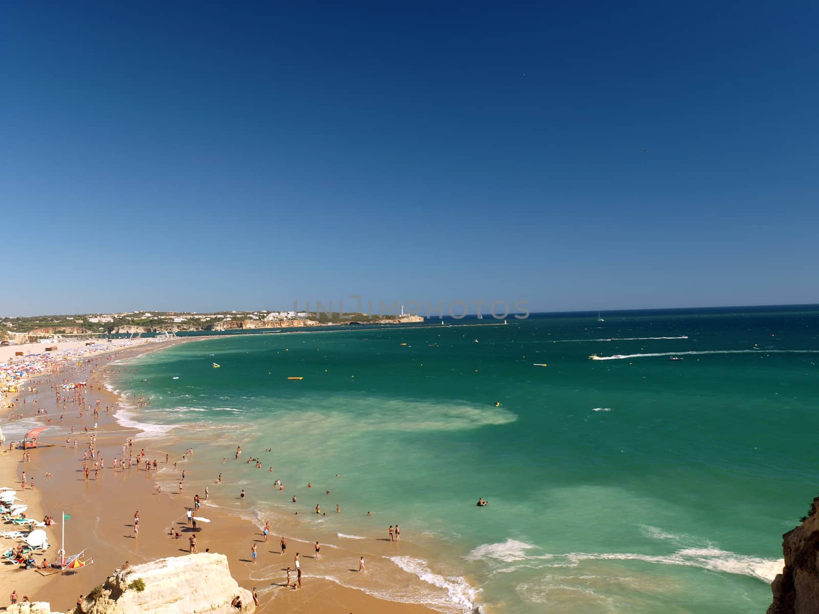 A section of the idyllic Praia de Rocha beach on the Algarve region. 
