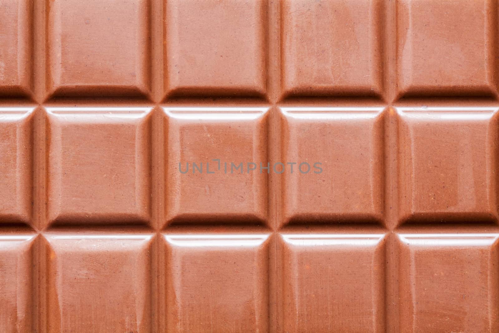 dark chocolate bar as background by sfinks