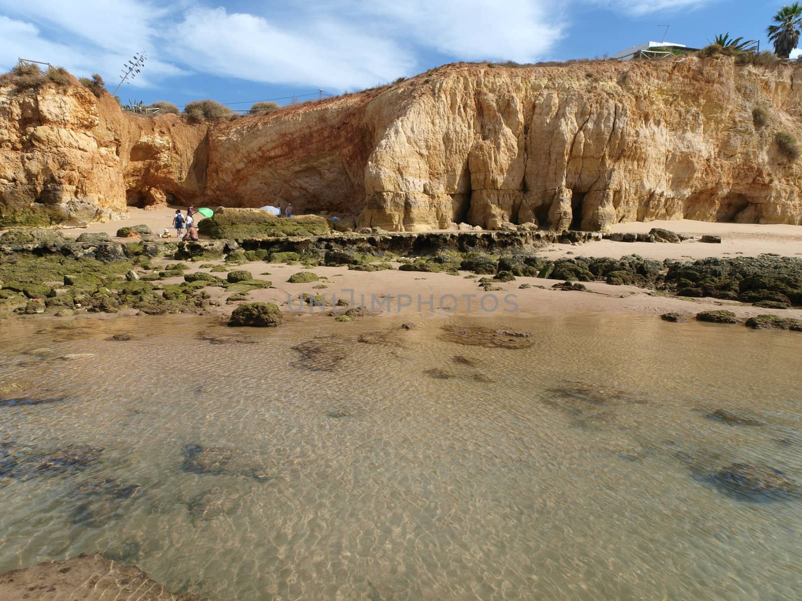 A section of the idyllic Praia de Rocha beach on the Algarve region. 