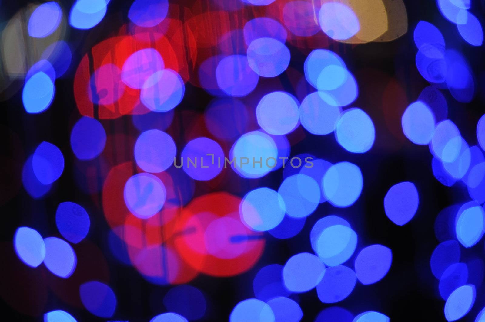 Abstract Christmas lights at Christmas night. by ngungfoto