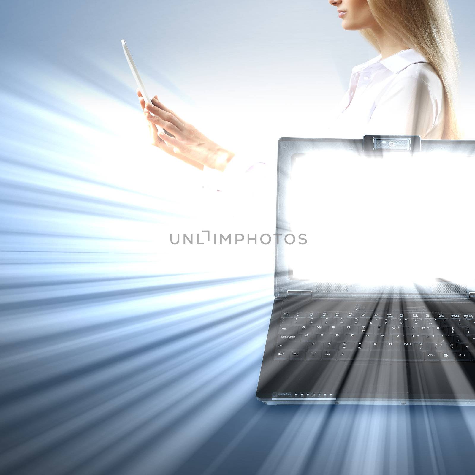 Image of notebook with shining screen and light