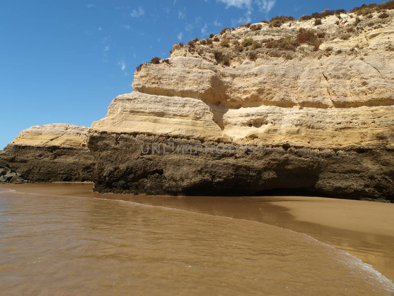 A section of the idyllic Praia de Rocha beach on the Algarve region. 
