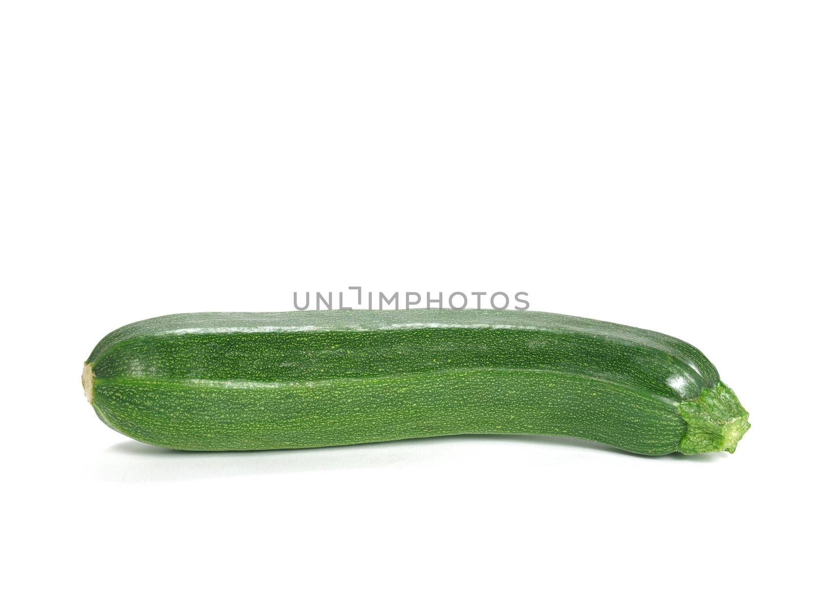 fresh and green courgette on white background