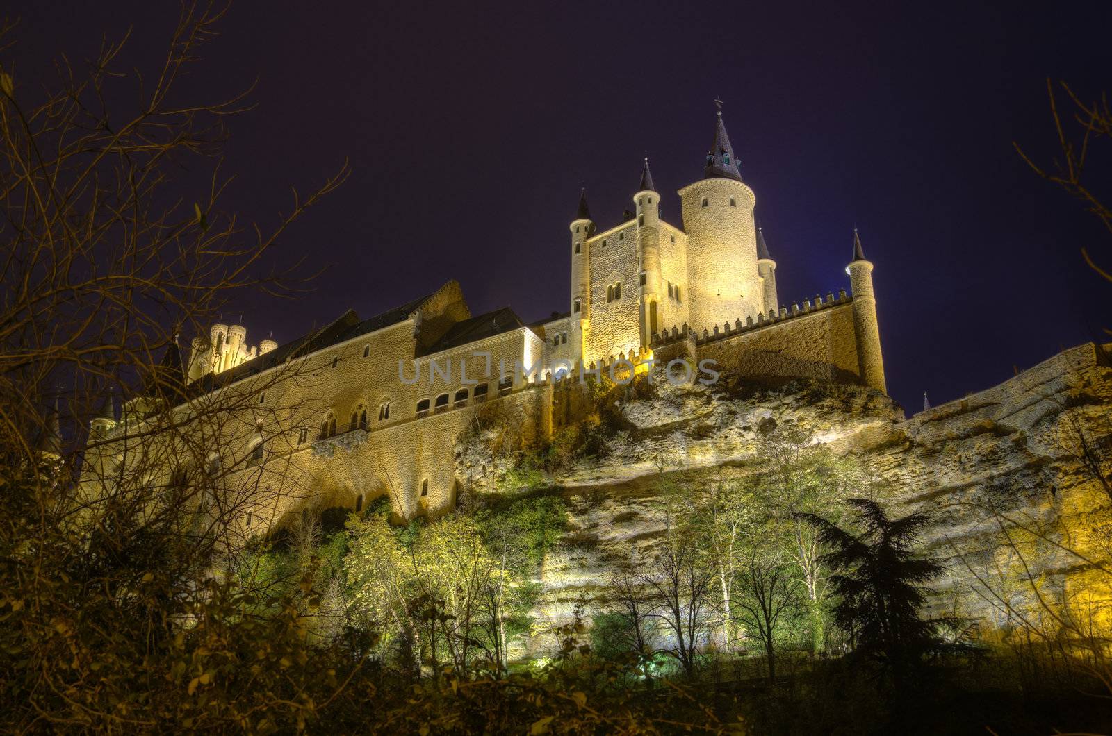 Segovia Alcazar Castle at night. Ancient Royal palace in Segovia Spain. by HERRAEZ