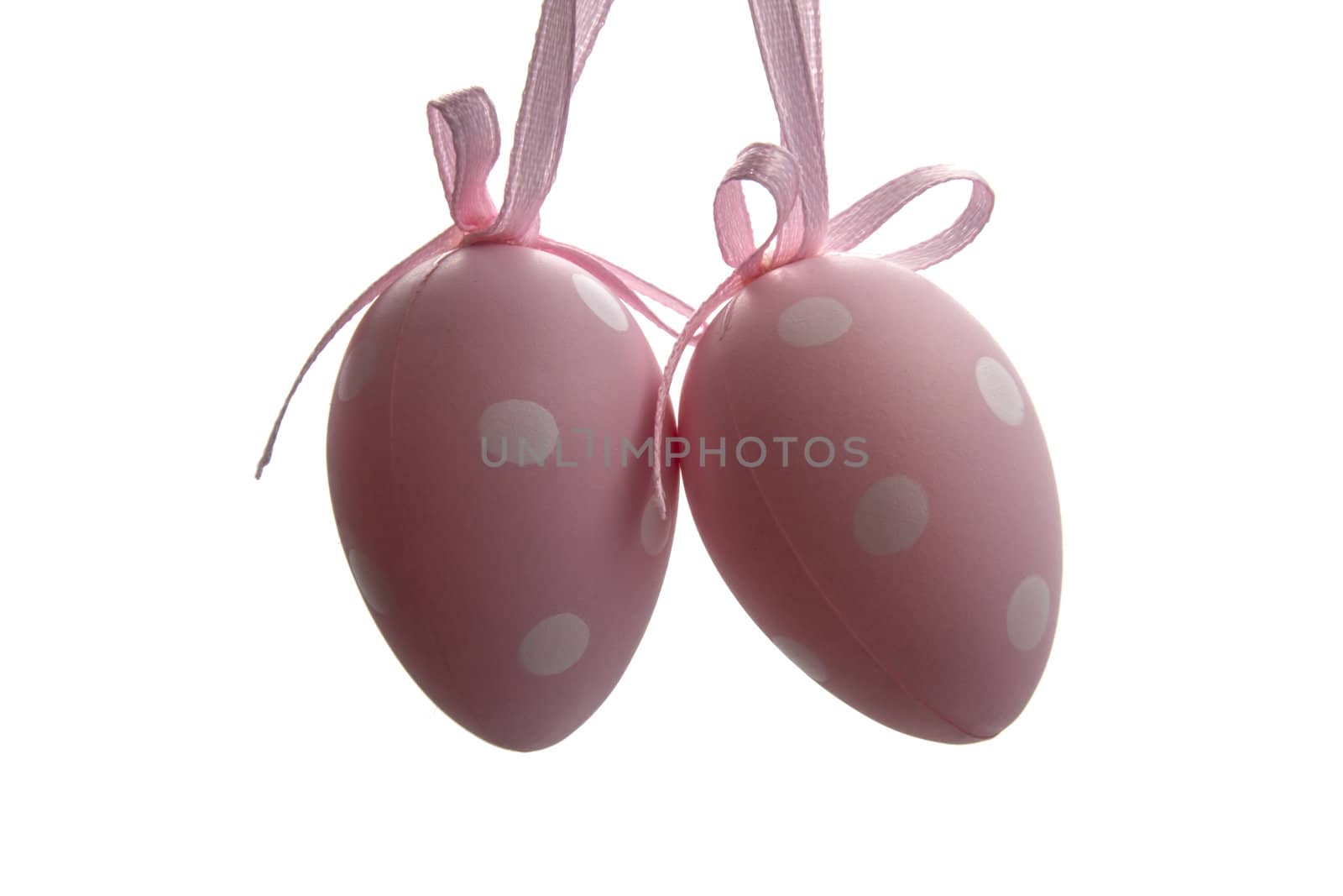 Pink easter eggs isolated on white background