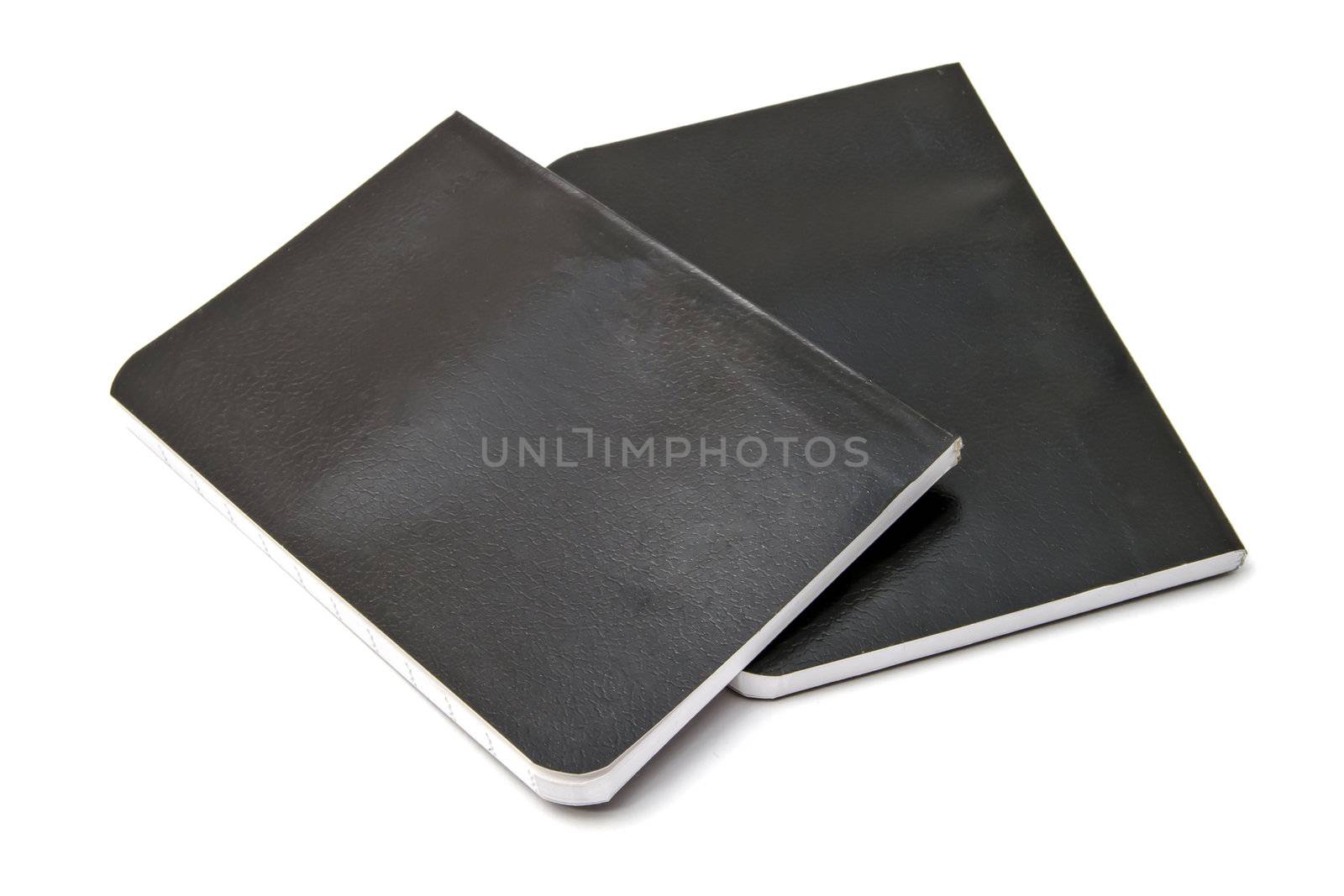 Small notebooks isolated on white background 
