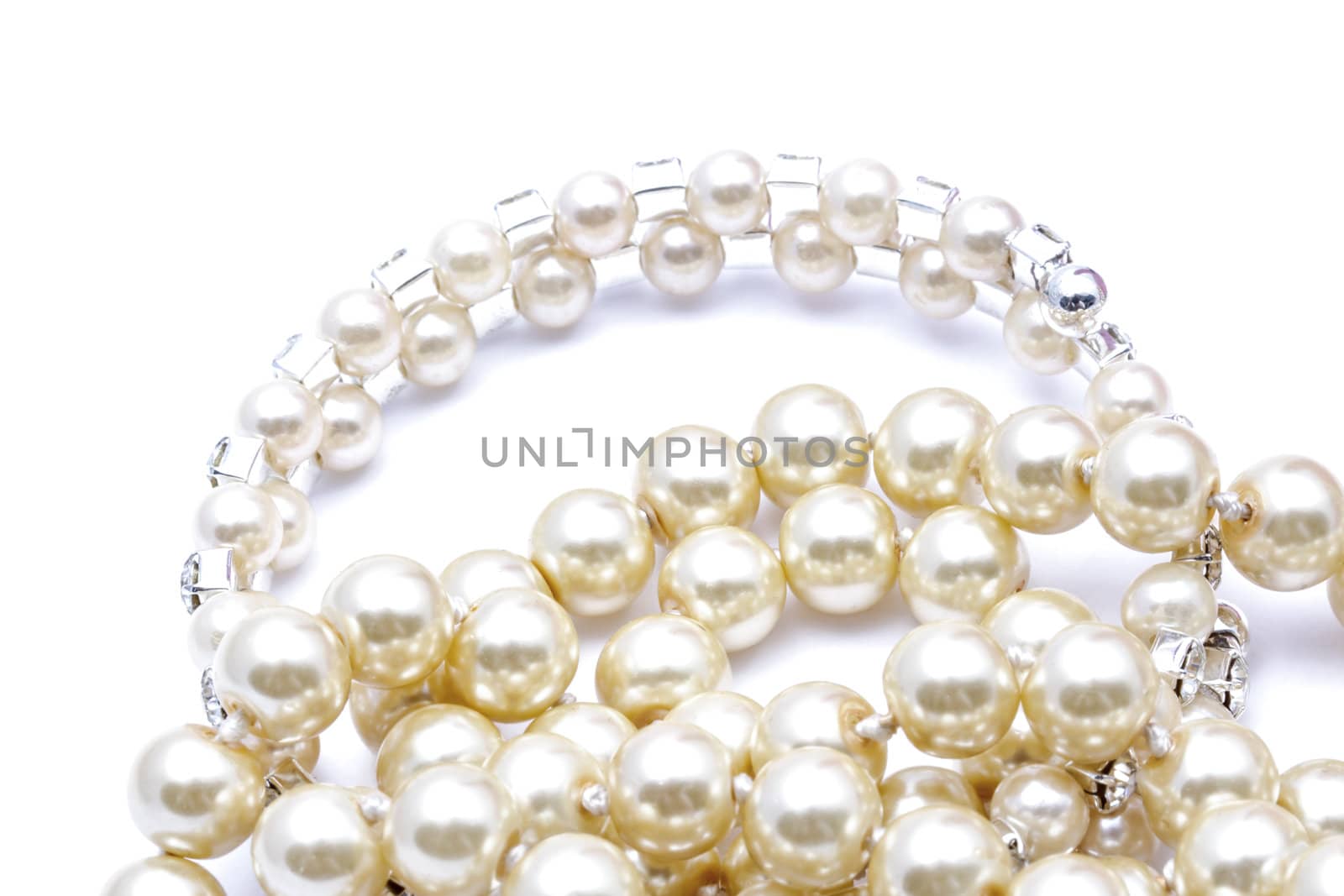 Beautiful string of beads isolated on white background 
