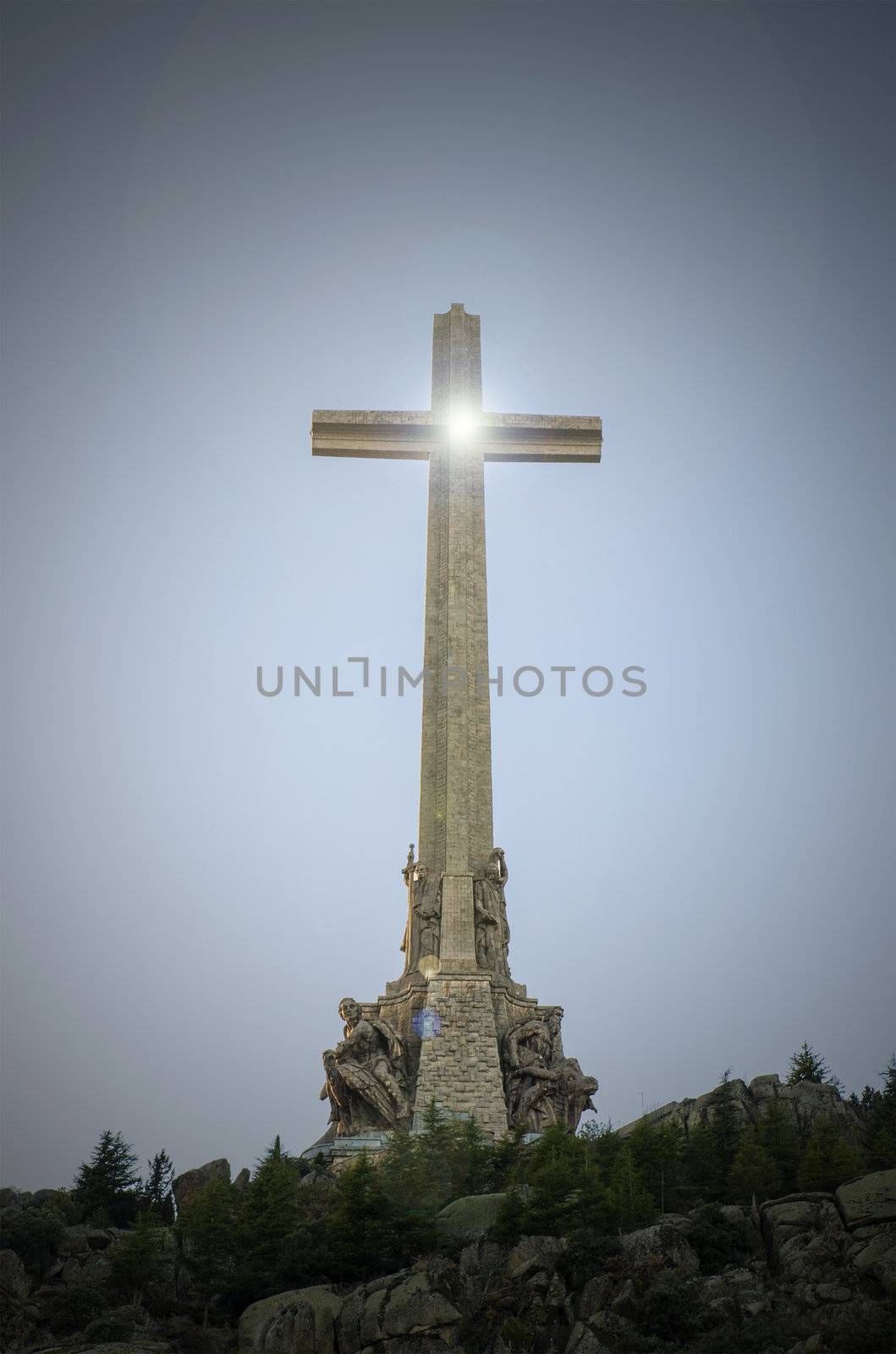 Christian Cross at Valley of the Fallen San Lorenzo de El Escorial Madrid Spain. by HERRAEZ
