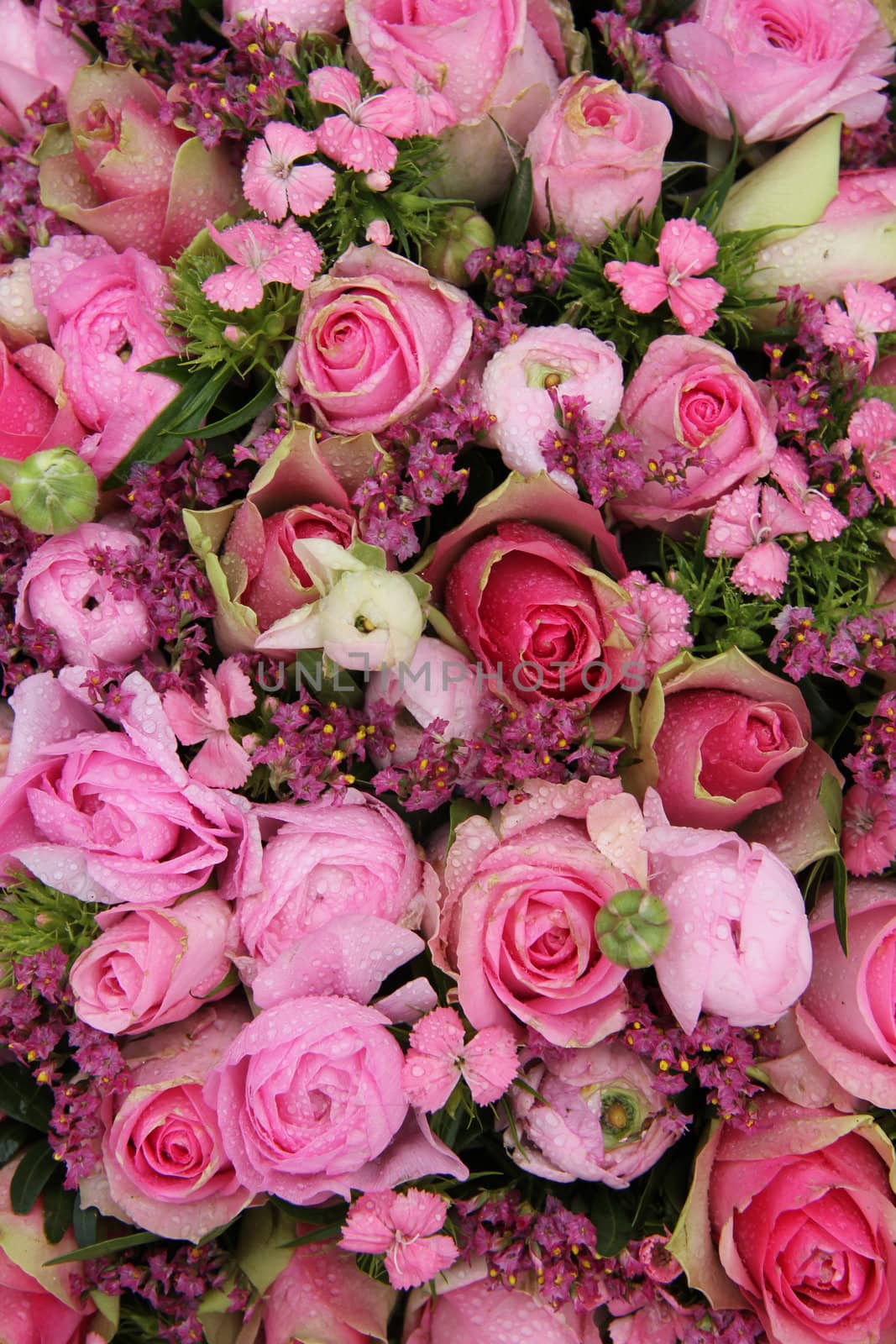 Mixed pink wedding arrangement, various flowers