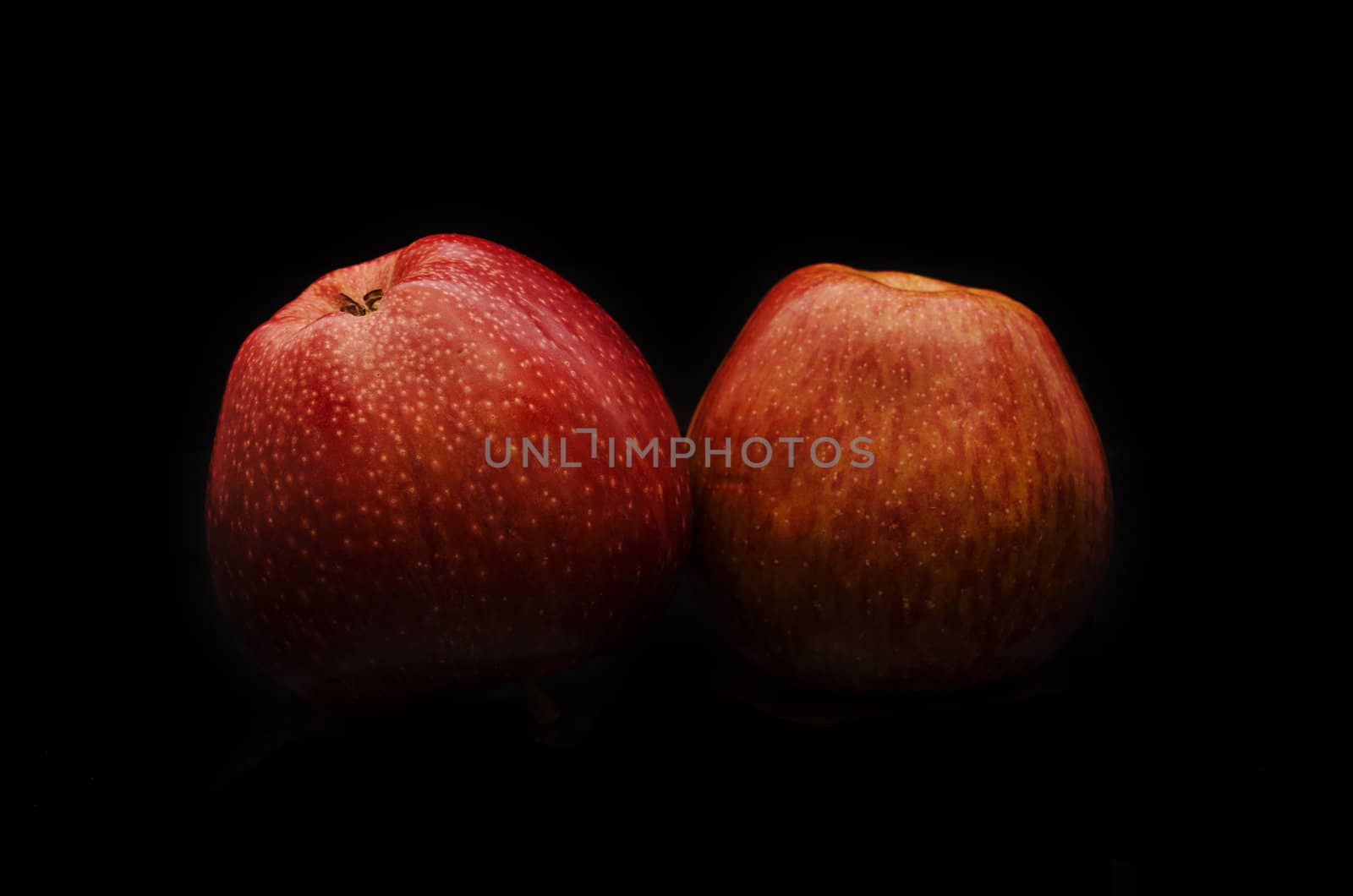 Pair of red apple without flash reflection by HERRAEZ