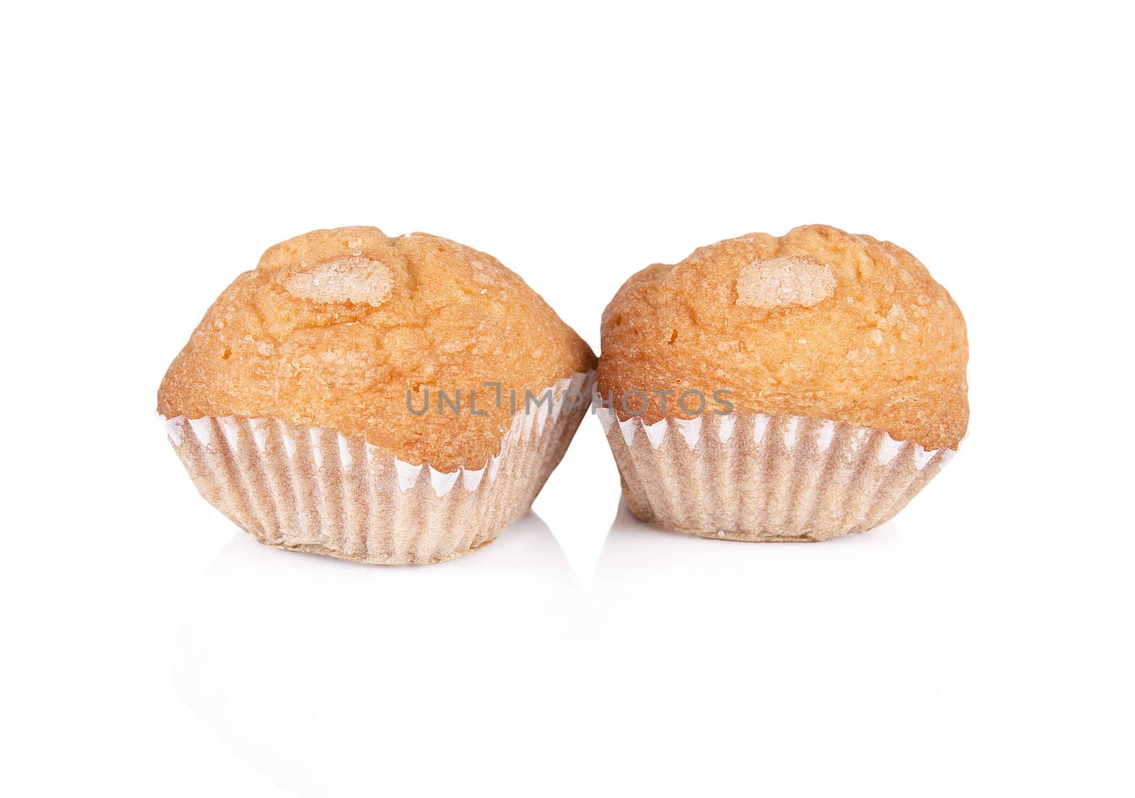 Pair of cupcakes over white isolated background