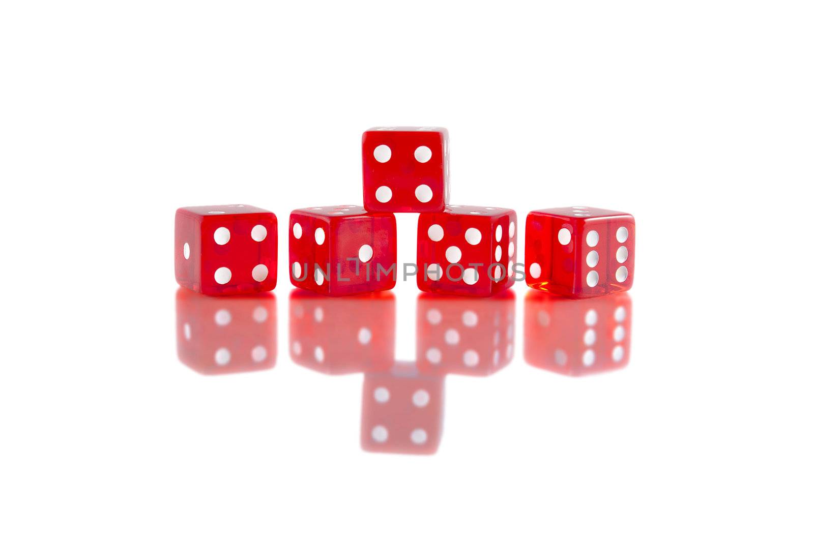 Red dice on white isolated background with beautiful reflection.