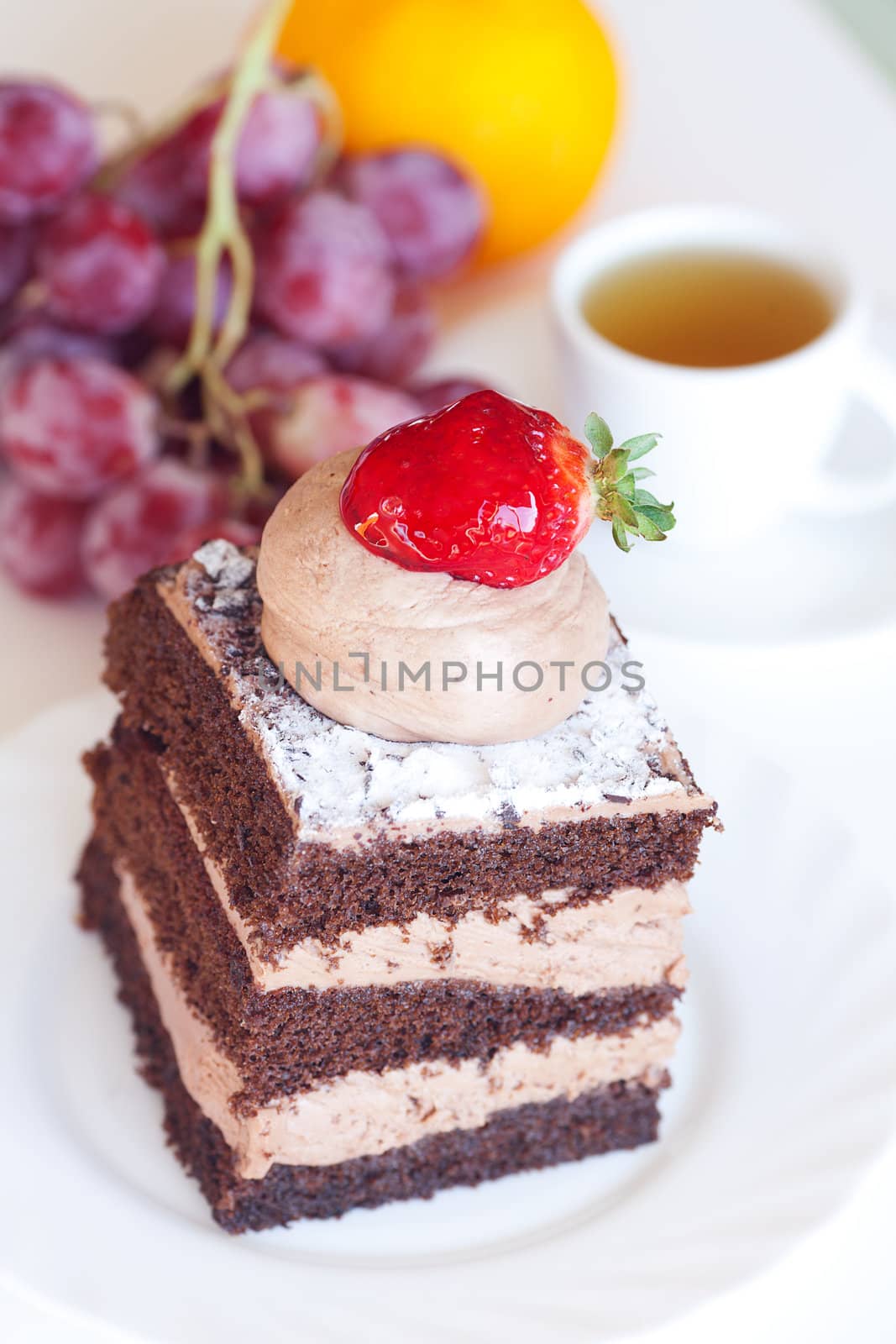 beautiful cake with strawberry,grape,mandarin and tea by jannyjus