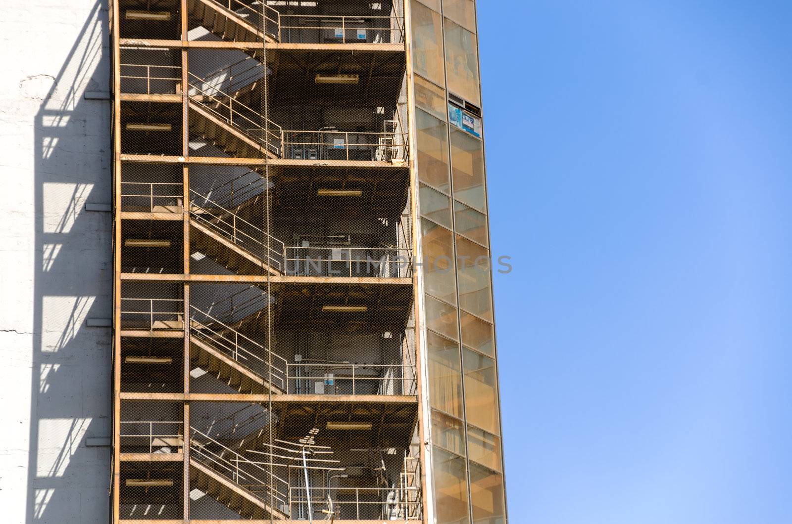 A fire escape running down the side of a building in Mexico City
