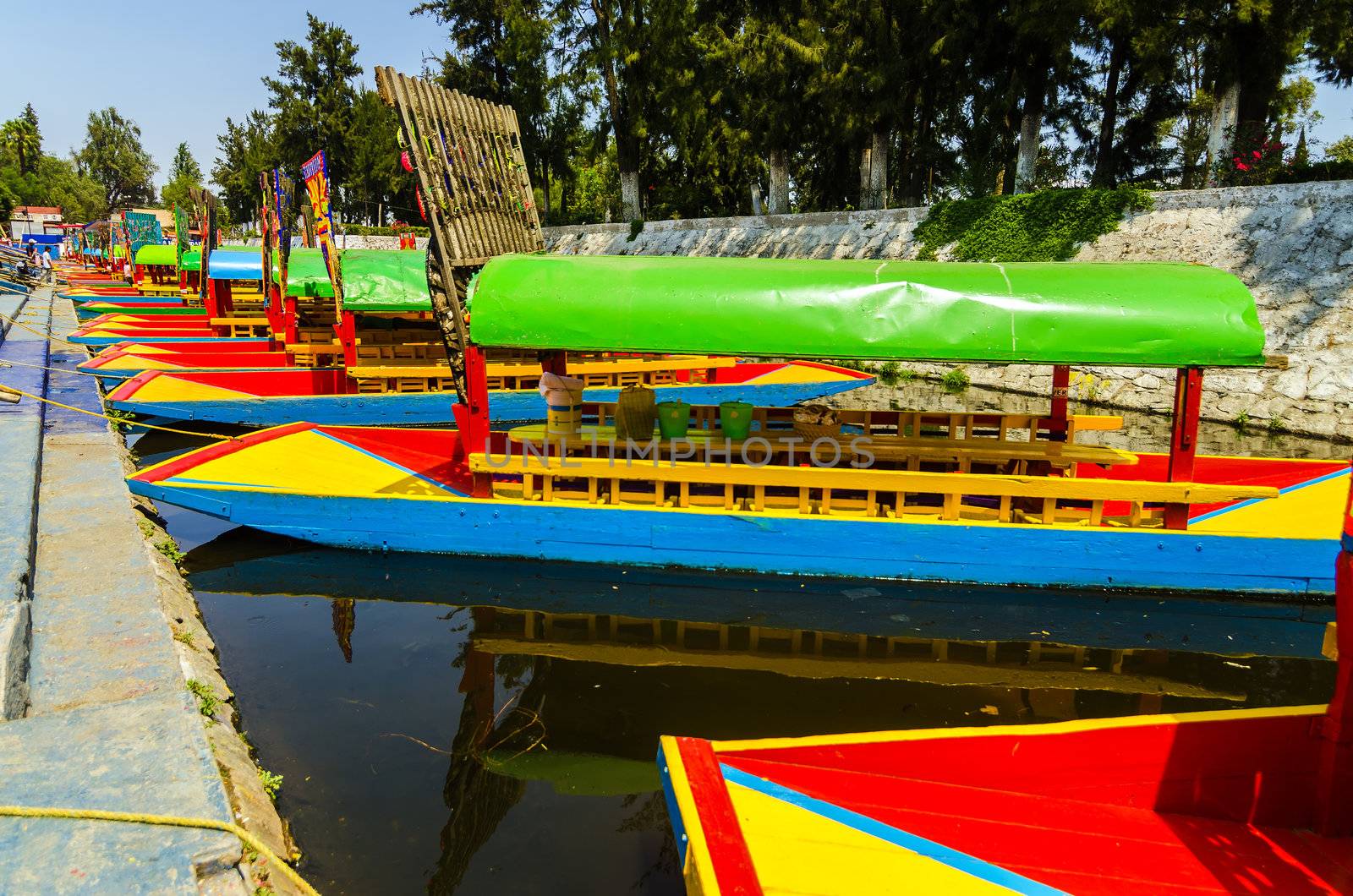Colorful boats in canal at Xochimilco in Mexico City