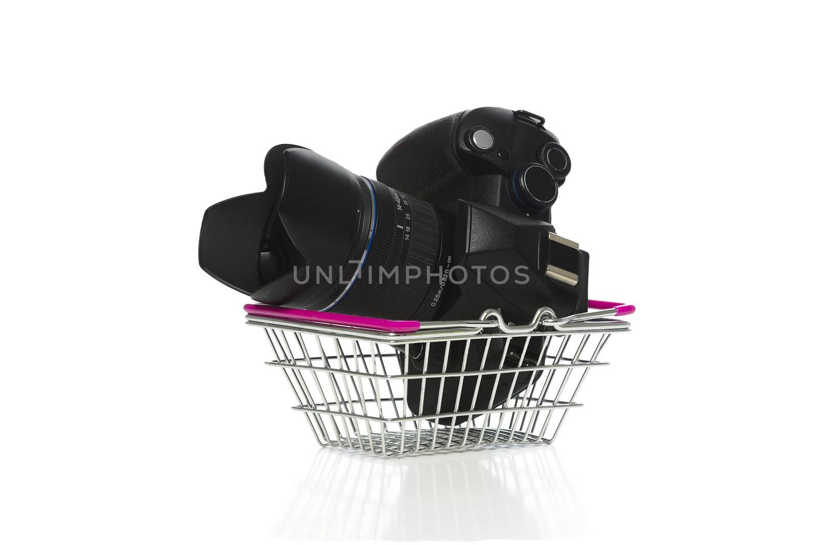 Camera and lens in a shopping basket by MOELLERTHOMSEN