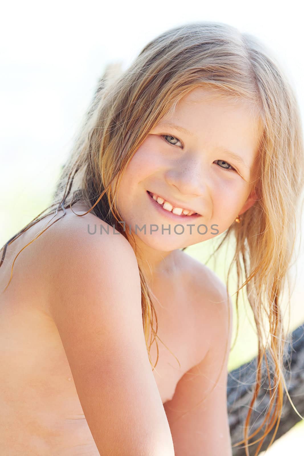 portrait of a beautiful little girl outdoor by jannyjus