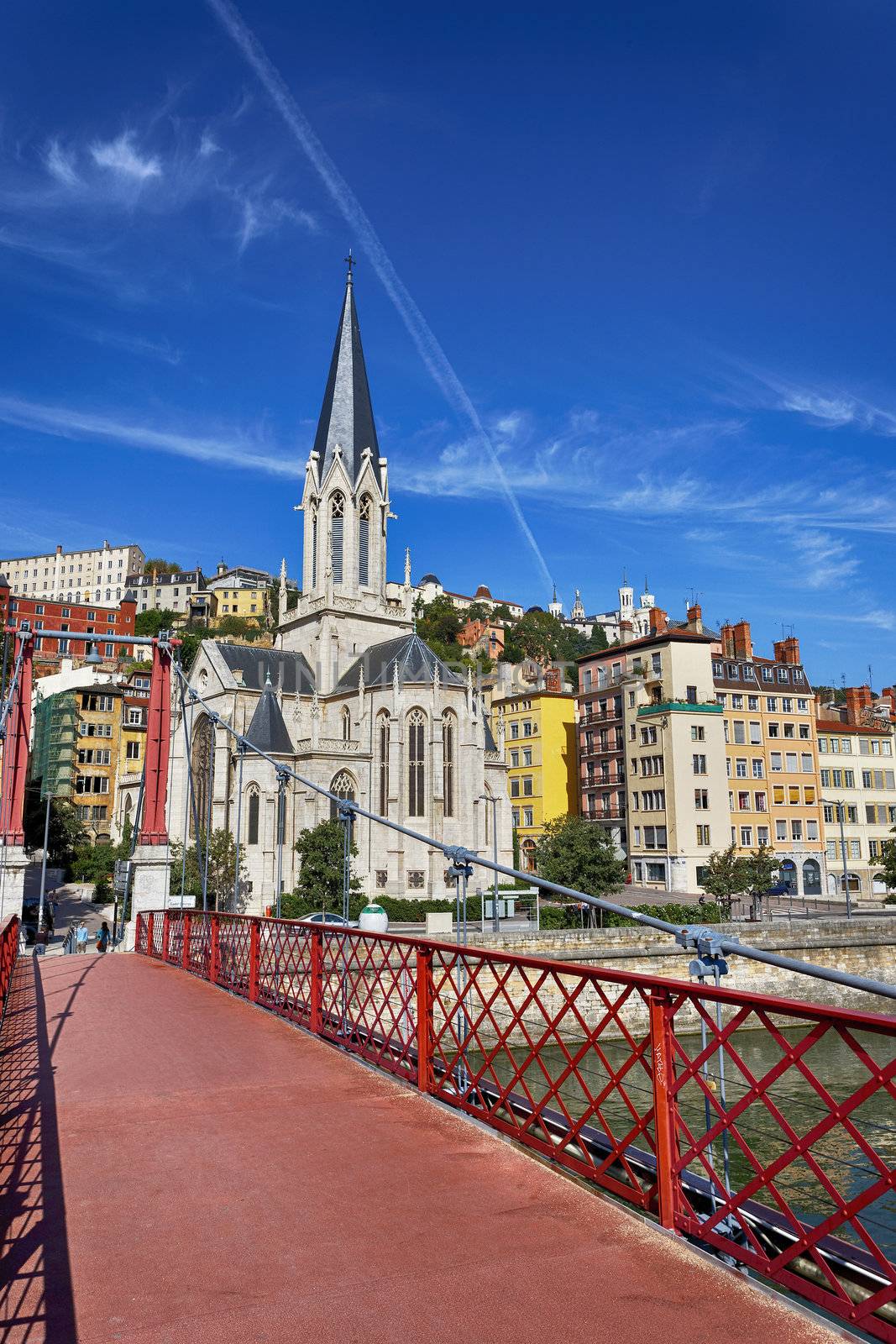 Lyon city with famous red footbridge on Saone river