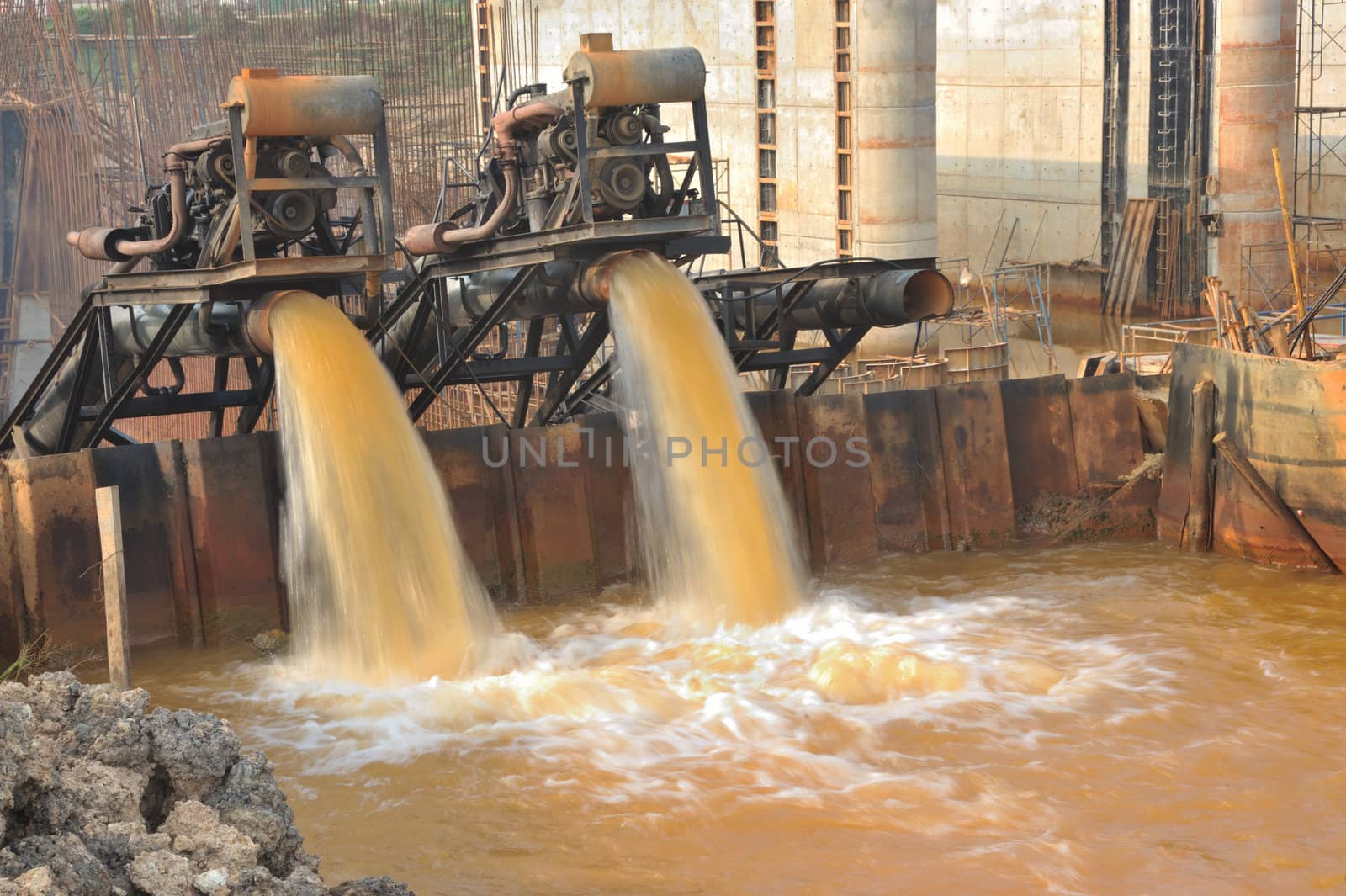 Water pumps were working at the construction.