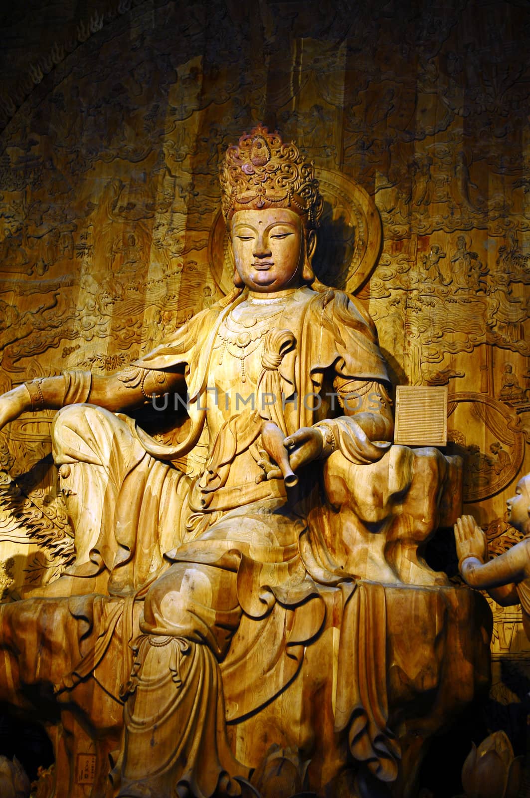 Wood-carving Buddha statue in a traditional Chinese ancient temple
