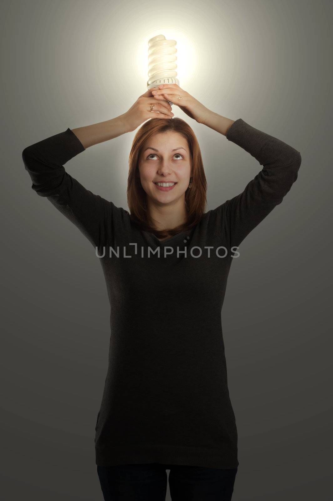 lovely girl holding a fluorescent lamp over his head  by gurin_oleksandr
